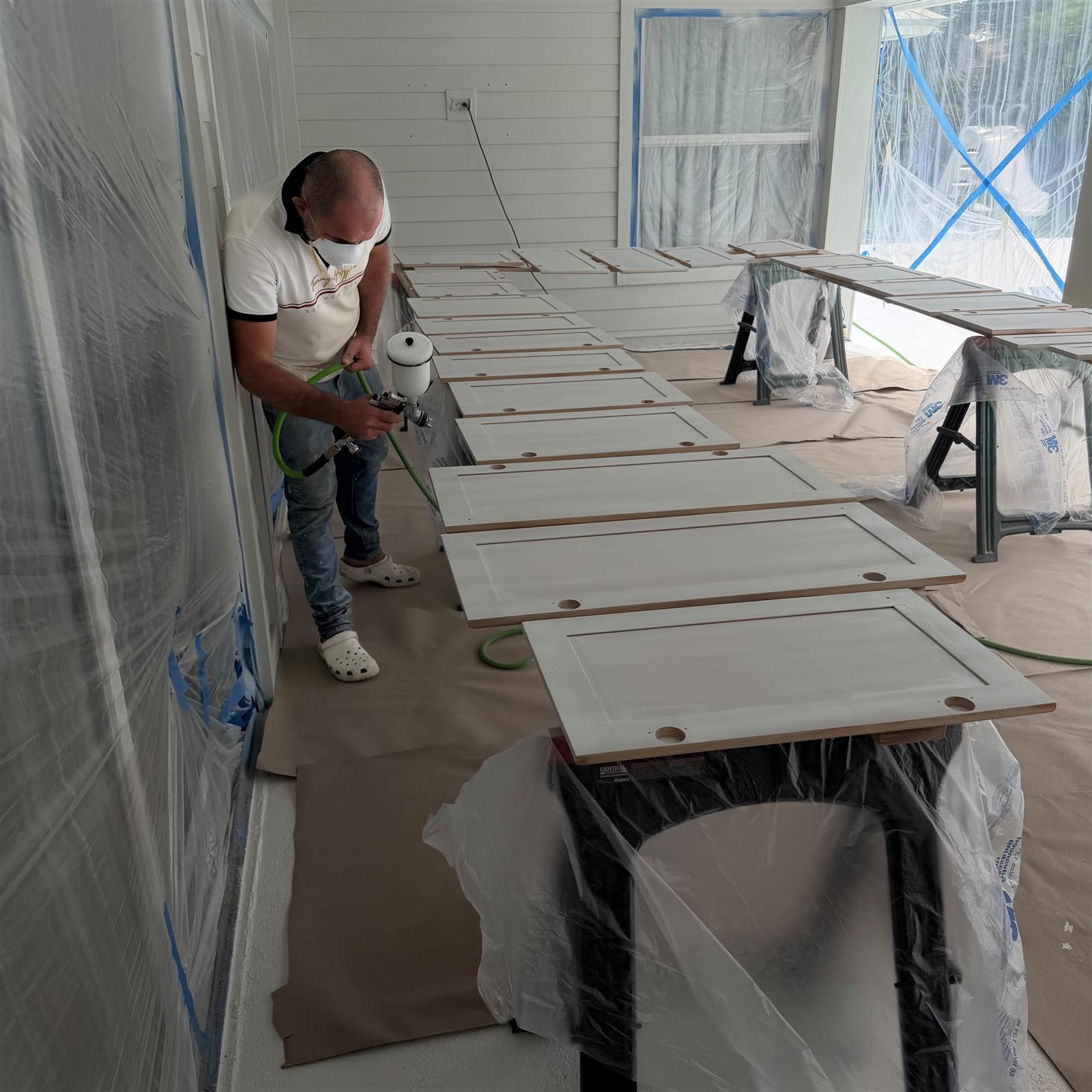 Cabinet doors being spray-finished